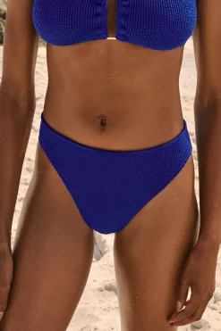 Bas de maillot de bain high leg en matière extensible