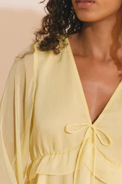 Blouse à volants avec manches transparentes