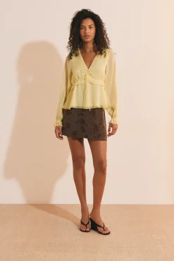 Blouse à volants avec manches transparentes