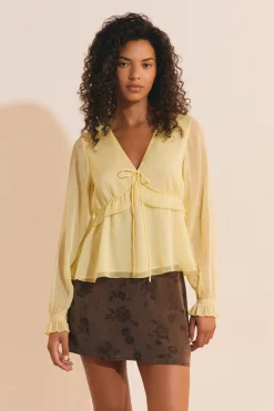 Blouse à volants avec manches transparentes