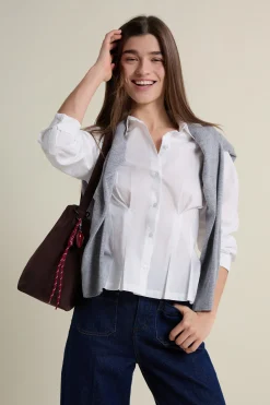Chemise cintrée à plis plats