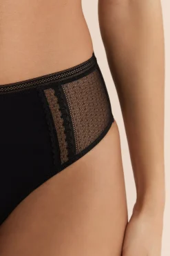 Culotte midi avec détails en dentelle