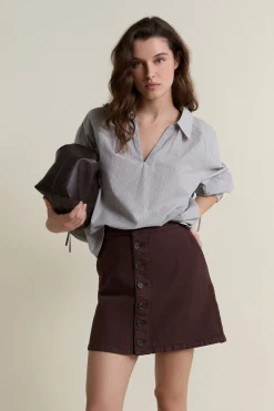 Jupe courte en jean boutonnée