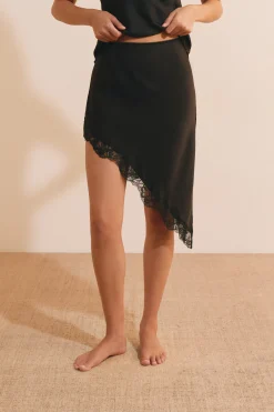 Jupe midi asymétrique avec détails dentelle