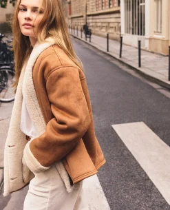 Manteau court en fausse fourrure