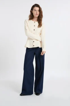 Pull peplum à boutons dorés