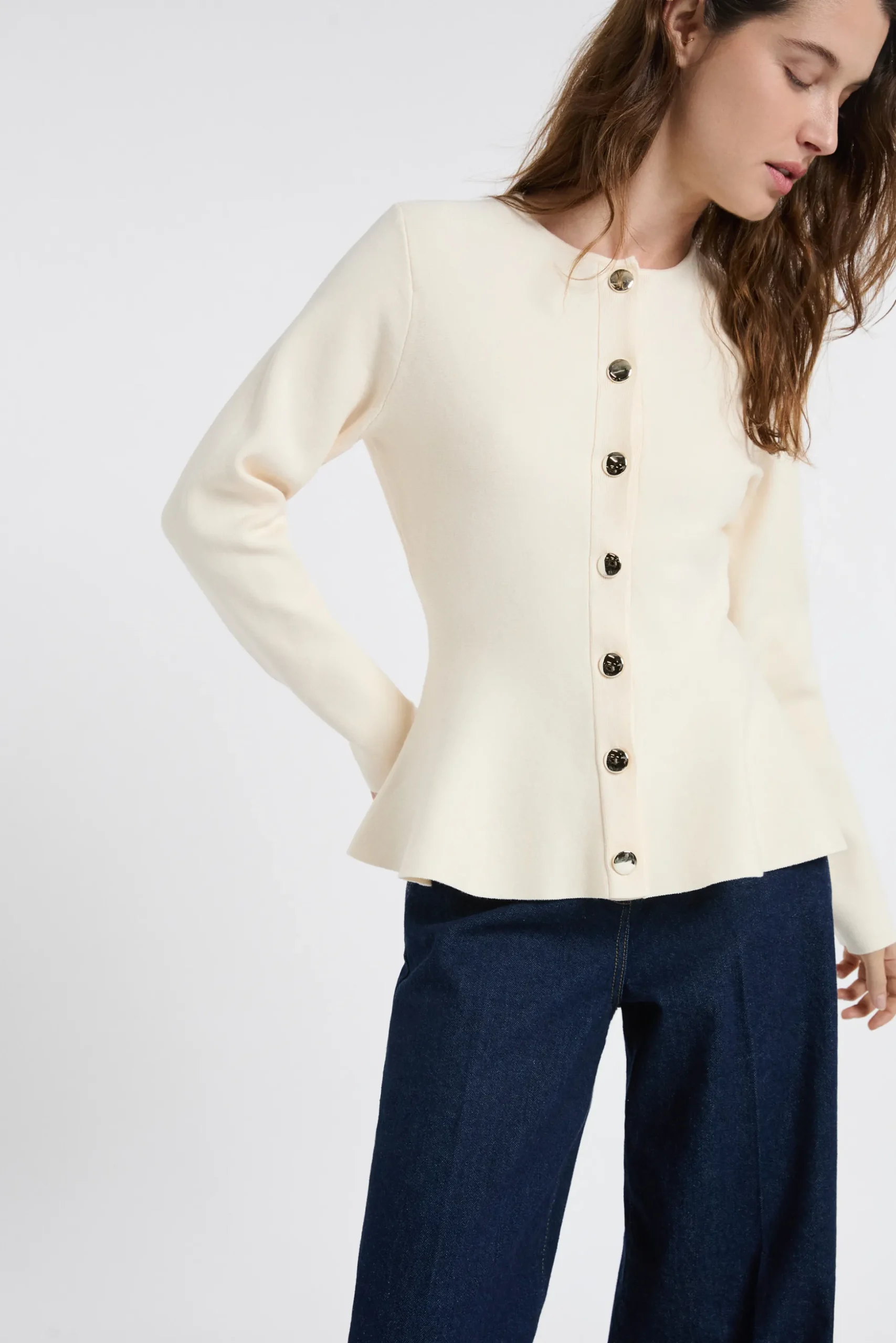 Pull peplum à boutons dorés