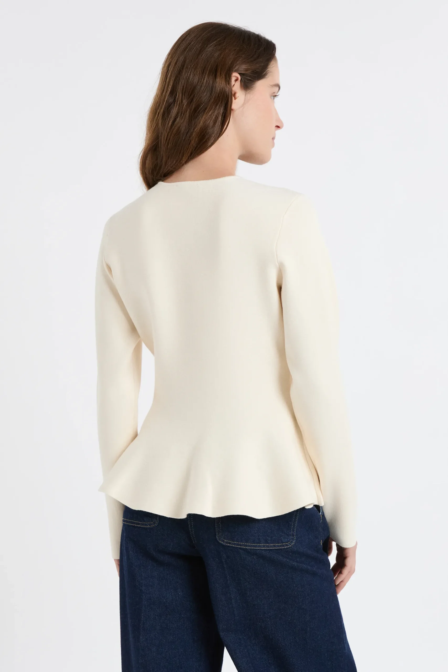 Pull peplum à boutons dorés