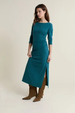 Robe longue en maille drappée