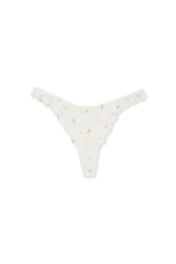 Tanga en dentelle à motifs
