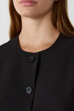 Top sans manches court avec boutons