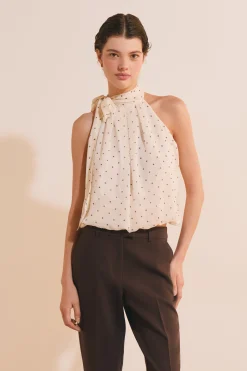 Top sans manches à pois